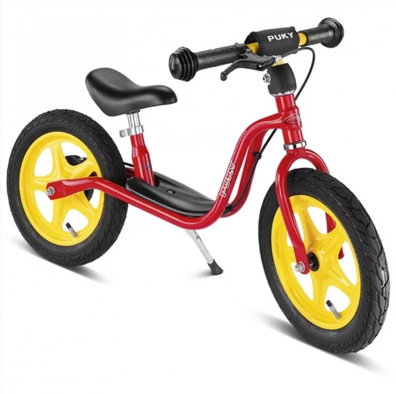 rød, gul og sort børne løbecykel